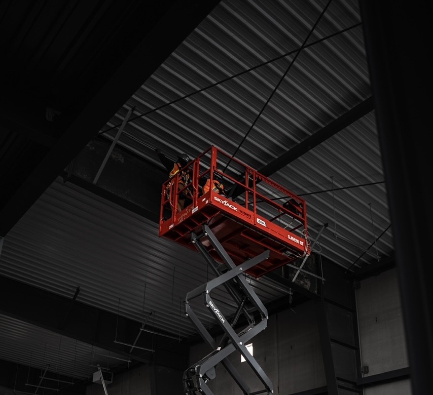 Aerial lift electrical work on a D.A. Electric job site